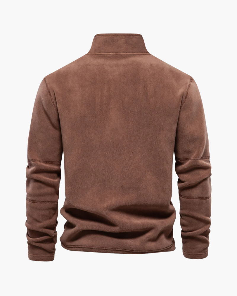 Tecido macio, gola alta com zíper e acabamento sofisticado para homens que valorizam o estilo clássico europeu no inverno.