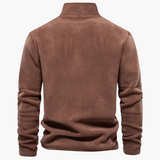 Tecido macio, gola alta com zíper e acabamento sofisticado para homens que valorizam o estilo clássico europeu no inverno.
