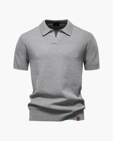 Camisa polo clássica verde escura, ideal para dias quentes com elegância