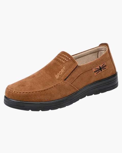 Sapato slip-on masculino com conforto anatômico e estética discreta.